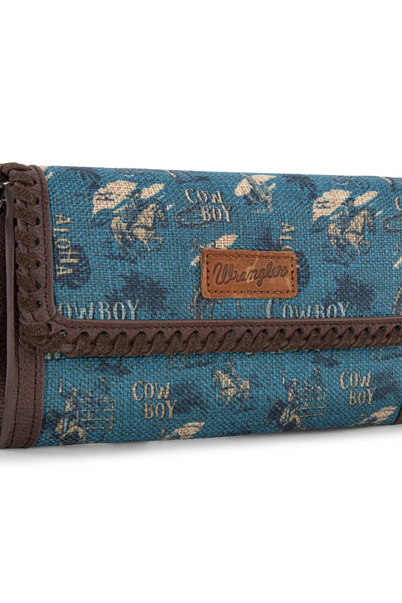 Trestles Clothing Company retro cowboy wallet with blue canvas print, brown whipstitch trim, and magnetic flap closure